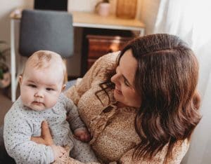 Katie Parker with a child during a parenting session.